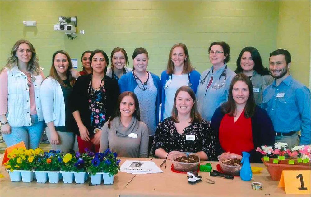 A group from Bay Path University at a community engagement experience at Brookings Elementary School in Springfield, MA.