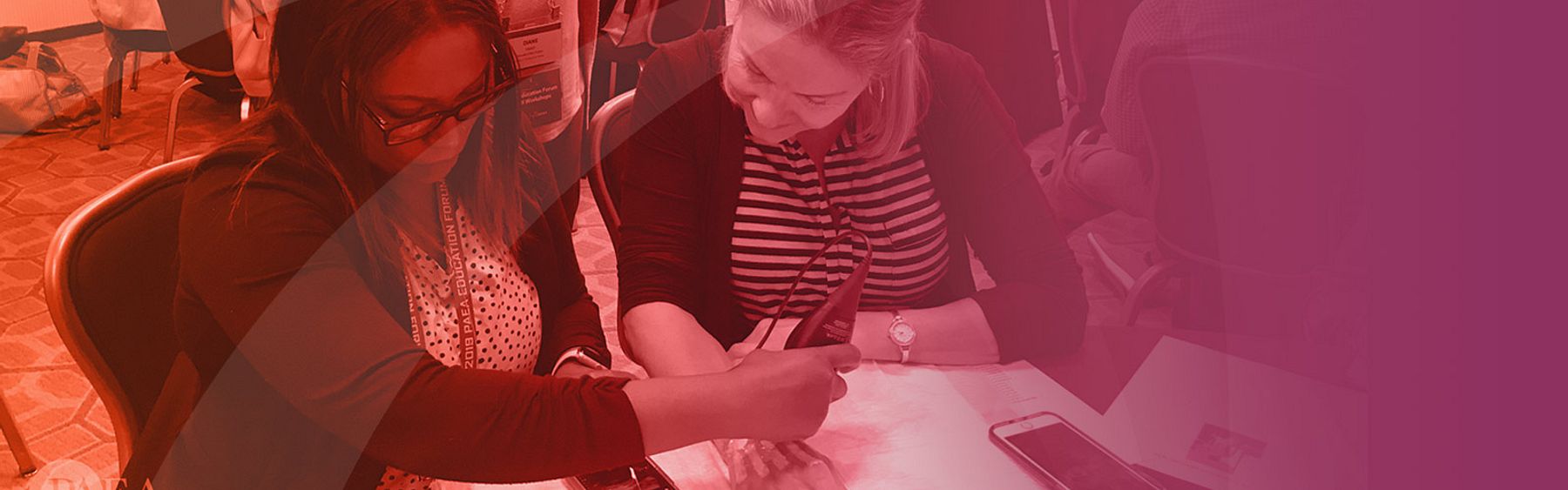 participants in a workshop with an orange and magenta overlay